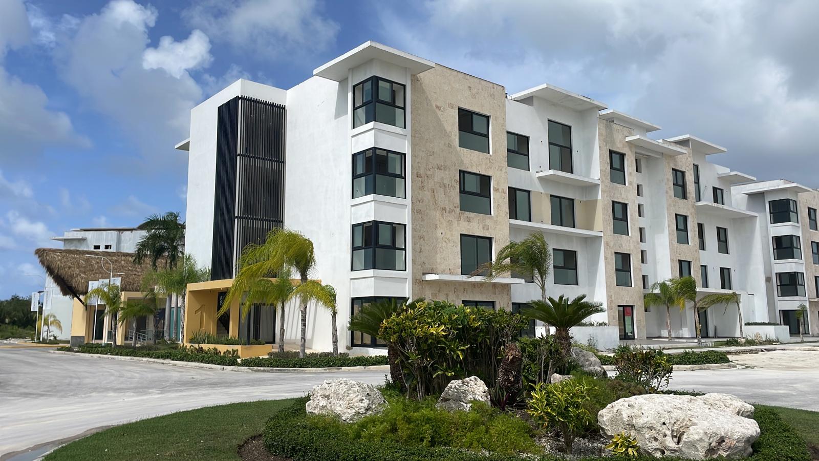 Minimalist luxury living room with natural light and marble accents
